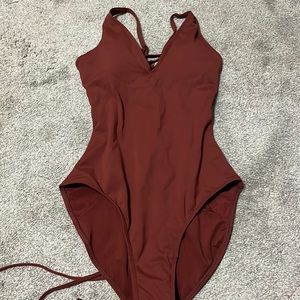 Brand new never worn TA3 sculpting swim one piece
